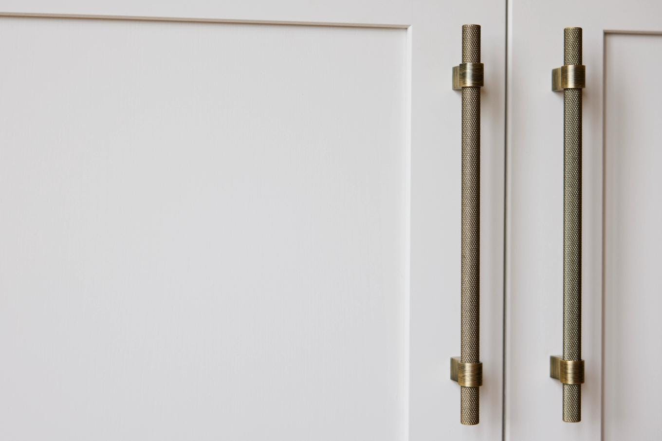 Brass knurled kitchen cupboard handles